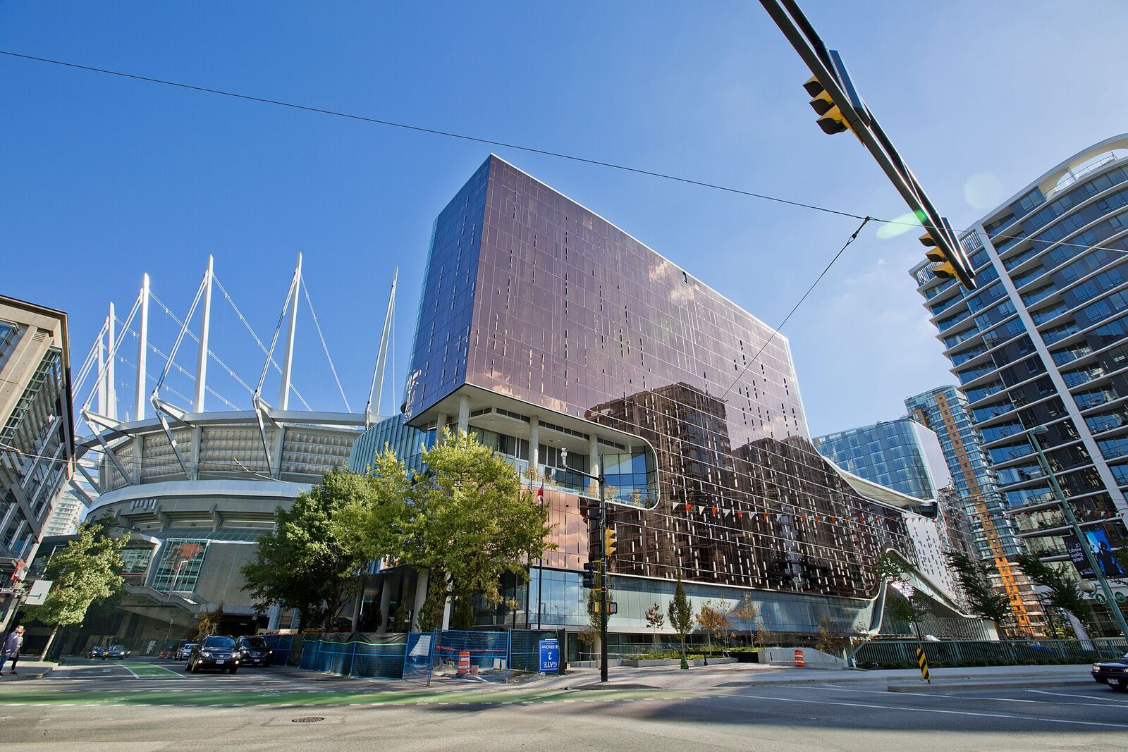 Parq Vancouver's bronze facade beside BC Place